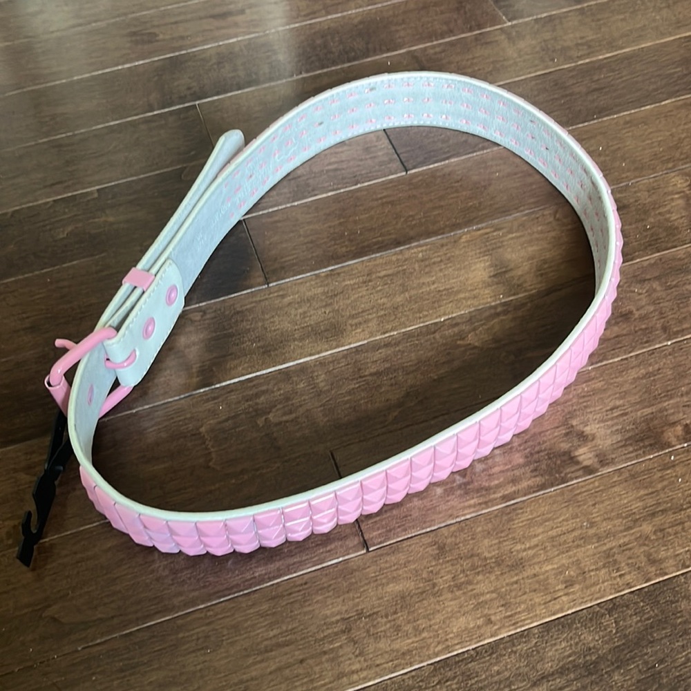 White leather belt with pink rivets size 36. Accessorize your Barbie outfit.